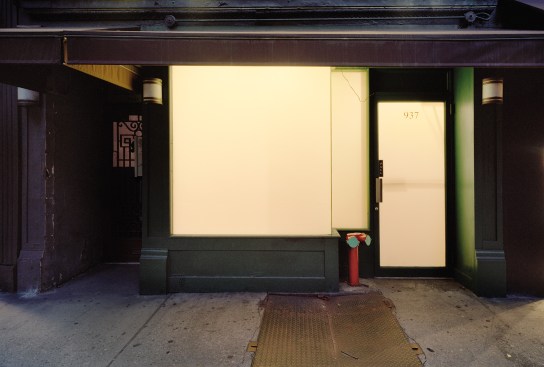 Lighted Windows, Madison Avenue, New York“This is the first photograph I took for my series Dark City: Urban America at Night. I was fascinated by the abstract shape of the glowing window. The paper-covered storefront gave the façade a flatness, which reminded me of Rothko’s paintings. For the first time, I could understand the appeal of a head-on view of a building.” -- Lynn Saville