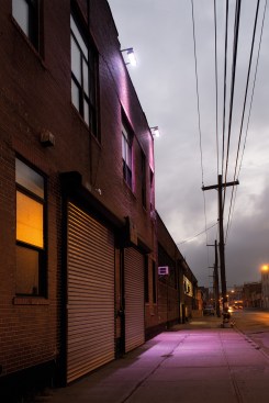 Warehouses, Bushwick, Brooklyn, N.Y. “Early one morning I visited Bushwick. The offbeat colored lighting seems to be part of the gentrification of this formerly industrial area.” -- Lynn Saville