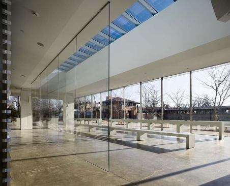 Transparency and light are the architectural motifs employed by architect Toshiko Mori in her design for the new visitor center at the Darwin D. Martin House Complex in Buffalo, N.Y. A study in contrasts that responds



to the original Frank Lloyd Wright masonry structure, the new pavilion makes use of natural light as its principal source of illumination by day.