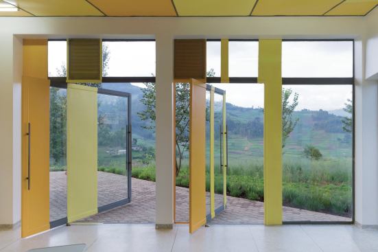 Large operable doors allow the infusion room to be opened to natural ventilation, and allow access to a patio beyond.