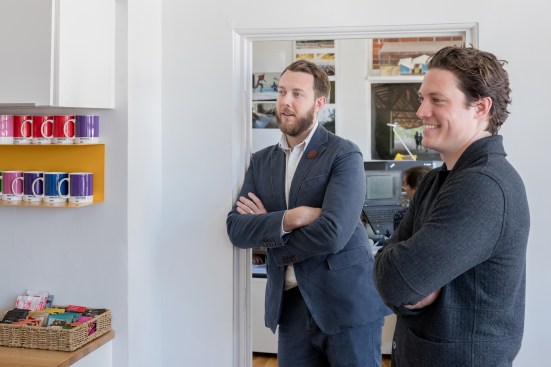 Alan Ricks and Michael Murphy (right) of MASS Design Group in the firm's Boston office.