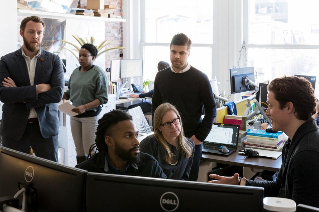 Left to Right:  Chief operating officer Alan Ricks, design associates Alicia Olushola Ajayi and Kordae Henry, senior director Sierra Bainbridge, director David Saladik, and executive director Michael Murphy in the firm’s Boston office.