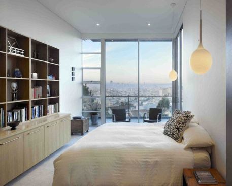 2009 CHDA Laidley Street Residence, San Francisco  Grand Award: Custom Home / 3,000 to 5,000 Square Feet  Zack / de Vito Architecture, San Francisco   The home belongs to Lise de Vito and Jim Zack, who run an architecture firm as well as a construction company. A translucent window wall provides postcard views of San Francisco that serve as the master bedroom's main decoration and a source of natural light.