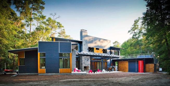 Public Voting Winners - Second Place:  The Althea Way House, Wilmington, N.C.  Designer: Scott Ogden, B+O Studio  Builder: ILM Design Build  Designer’s description:  The clients found a “remnant” site that borders a greenbelt/bike path and requested a low-maintenance, open house for their family of five to live and grow. B+O chose to break the owners’ program into four elements to create an open courtyard in this private, sylvan setting. The owners desired a clean, simple, contemporary design working with the lot in such a way that views of the greenbelt and north terrace are always present within the house.