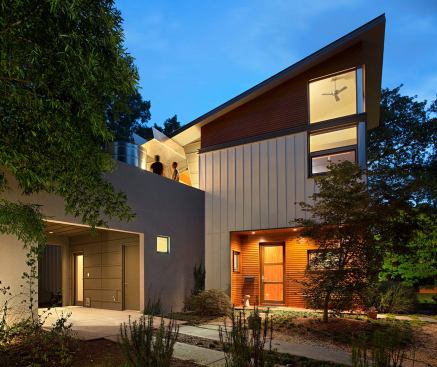 Public Voting Winners - Third Place:  Graham Street Residence, Raleigh, N.C.  Designer/Builder: Will Alphin, Alphin Design Build  Designer’s description:  An overarching goal was to have the new home minimize its environmental impact, both during construction and over its planned 100-year lifetime. Sustainable, energy-efficient systems were incorporated into every aspect of the house, including the design, site orientation, mechanical systems, and materials. The building seeks to simultaneously fit within the context of the 1950s neighborhood, embrace the diverse influences of the Triangle area, utilize vernacular style and strategies appropriate for the Southern climate, and express our modern era of sustainability. Physically and metaphorically, the house carefully “hugs” a mature oak tree on the south side.