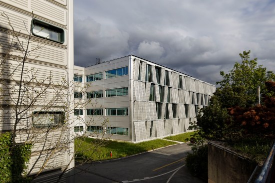 View from northwest, with contiguous existing building at left