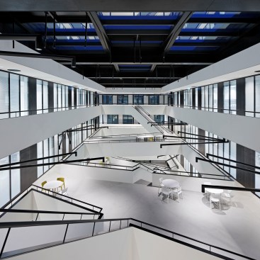 Central atrium with stairs and lounge areas