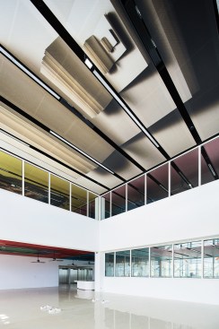 Double-height space with another Batory illustration on the ceiling