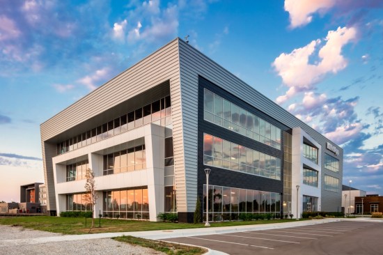 The “Innovation Campus” at Wichita State University uses a variety of metal panel profiles to tie the campus together while allowing buildings to keep their own identities. Photo: alanblakely.com