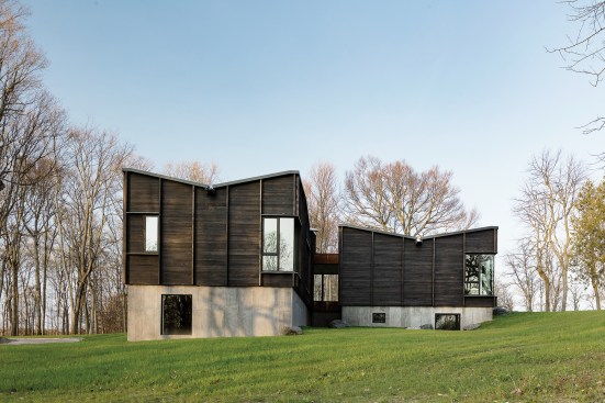 The house is clad in shou sugi ban siding from Delta Millworks.