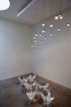 Omer Arbel, creative director for Canadian company Bocci, showed his spherical refined industrial glass 14 pendant light in Milan's Ventura Lambrate district. 
bocci.ca, 
omerarbel.com