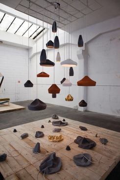 Made in Berlin's "Poetry Happens" show included ceramic lamps by Barcelonan's Apparatu and Berlin's Mashallah who designed them in a collaboration that took place entirely by fax machine. 
apparatu.com