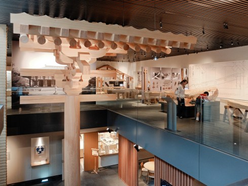 A view of the double-height space within the permanent gallery, showing a full-scale structural detail of the Yakushiji Temple in Nara, Japan.
