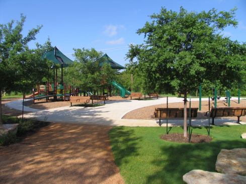 Designed according to New Urbanist principles, Mueller features single-family and multifamily homes, a mixed-use town center, and 140 acres of parkland as well as a children’s medical center and a film studio. All houses in the development are required to earn a three-star energy-efficiency rating from the Austin Energy Green Building Program.