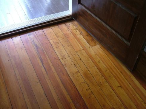 Rich with character, this flooring was one of several materials BuildSense salvaged from the original home.