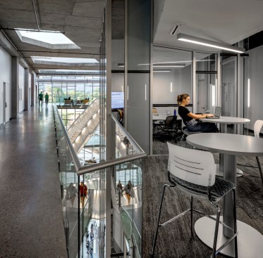 Third-floor breakout space with atrium beyond