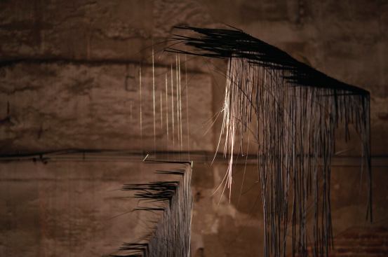 A detail from "Unlit."