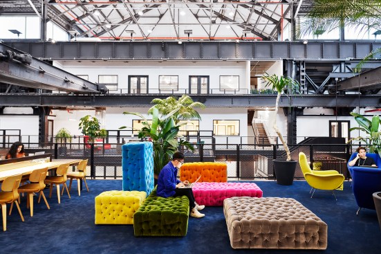 A breakout space in the New Lab's mezzanine level pops with bright, plush furniture pieces by Italian architect and designer Gaetano Pesce. Artist and designer Ricky Clifton helped coordinate the interior design of the New Lab.