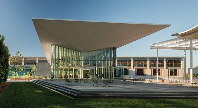 The entrance to the library addition anchors the south end of the public green.