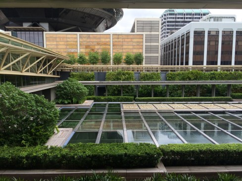 Water pooled atop the museum's glass roof diffuses sunlight.