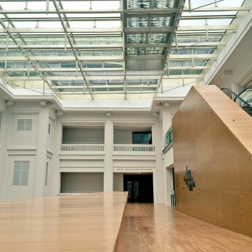 The portion of the gallery that exists below the water-topped glass roof and is daylit during the day.