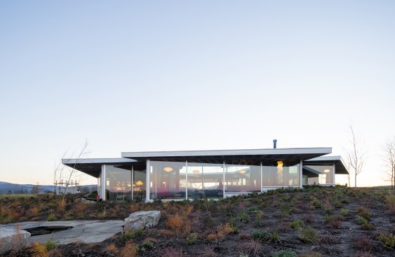 Six overlapping petal-like pavilions create the Flower House, a flower-shaped weekend home in Massachusetts, which is designed with an octagonal courtyard and interconnected spaces that bring a family together. Each pavilion is optimized for passive heating and cooling, solar access, and natural ventilation, as well as the rituals of daily life.
