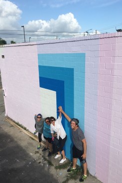 The group completed a mural as part of a design project for a community gathering space.