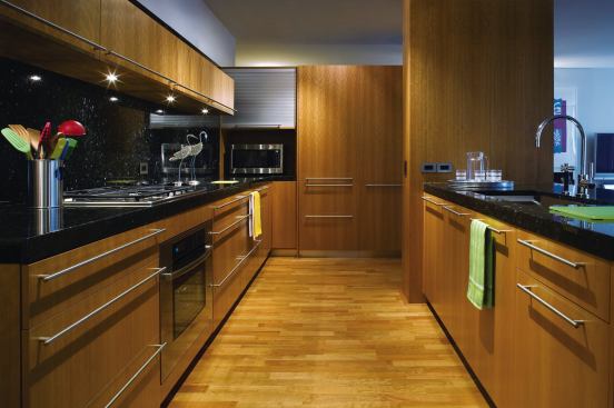 Buyers are allowed to outfit their units with selections from a catalog of kitchen cabinets and other details. Like those of many other developments, the Old Orchard Woods catalog includes stock and custom options—such as Merillat and Ameriscan cabinets—that have an effect on the duration of the installation process and the look of the end product.