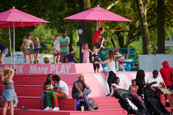 Oval+ in 2019, which included seating, a massive sandbox, and a misting pavilion