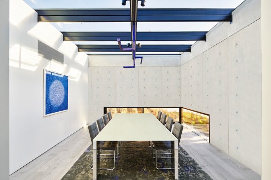 Skylights and 30-inch-tall ribbon windows illuminate the dining room.