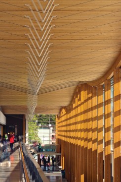Curvilinear nail-laminated timber ceiling in Samuel Brighouse Elementary School in Richmond, British Columbia, designed by Perkins+Will