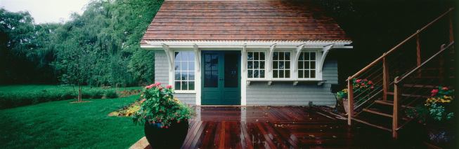 When zoning restrictions nixed any expansion or removal of an existing boathouse, this structure got a facelift instead. Built with a traditional English cottage flavor but the clean style of more contemporary architecture, the structure fits in beautifully with its lakeside surroundings without looking out of date. 
Architect: Albertsson Hansen Architecture, Minneapolis 
Builder: Artisan Builders, Minneapolis