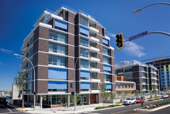 The first phase of residences at Dockside Green, LEED-Platinum Synergy boasts double-glazed, low-E windows, ultra-efficient insulation, and external shading on most south- and west-facing windows to minimize heat gain in the summer but allow for daylight at other times of the year.