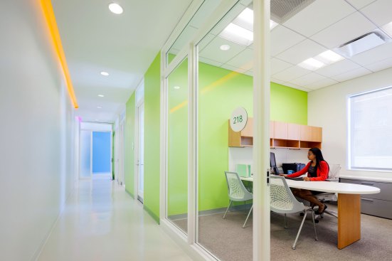 The offices use a 24 x 24 recessed linear fluorescent 24W 3500K fixture. The combination of fluorescent and LED sources allowed the project to achieve a 5 percent energy savings beyond the stringent limit of 0.90 watts per square foot.