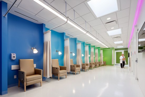 Skylights provide ambient light in the patient recovery area and a wall-mounted reading light adds a residential touch.