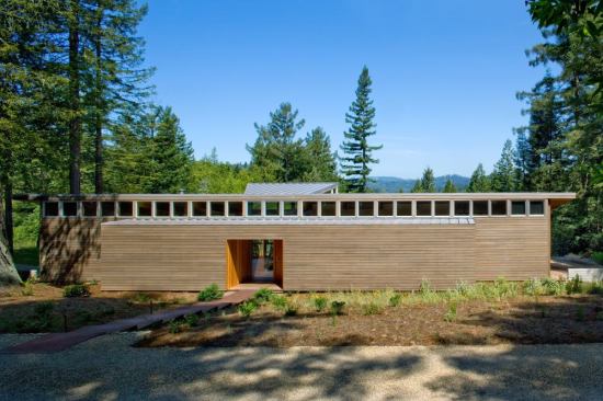 Clerestory windows on the entry side of the house assist with cross-ventilation.