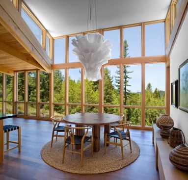 Views from the dining area are framed by a glass-sided pop-up.