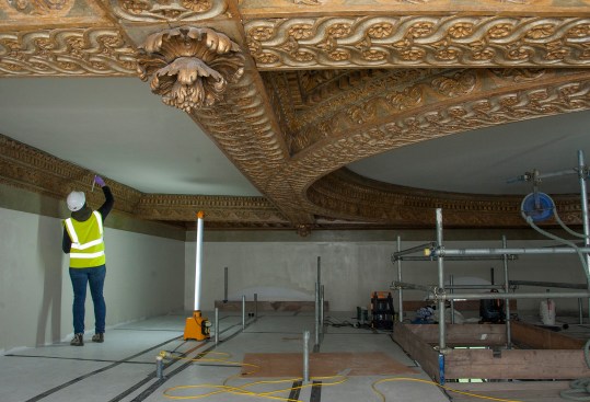 Installing the Richard Wright piece on the ceiling of the Great Hall