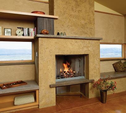 The fireplace is shaped with sprayed earth.