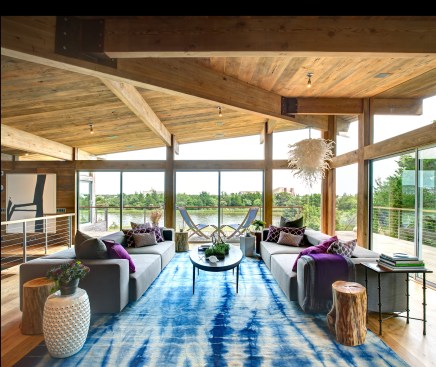 The post-and-beam structure of the original home informed the remodel and provides handsome, solid details that also help to direct the eye outward.