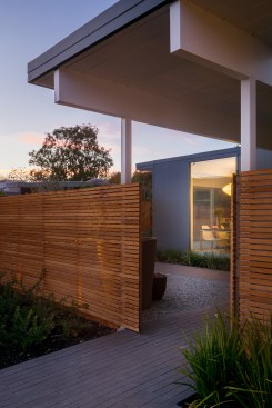 The fence also creates a space for the owner's young daughter and the family dog to play safely.