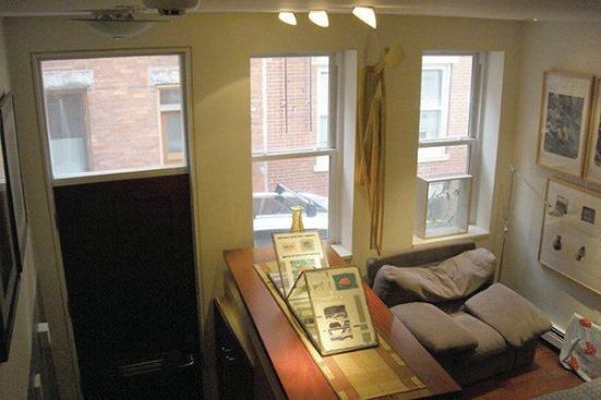 The existing entry had stairs leading to the main level. The basement space is below it.