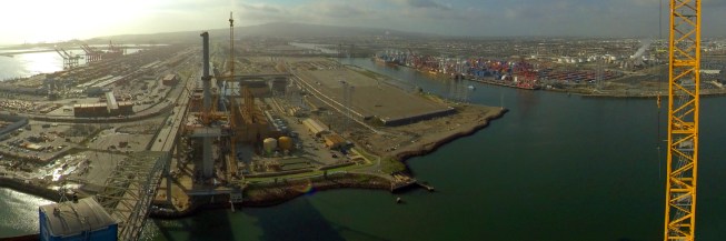 A film still captured from the exhibition RECKONstruct, an immersive film for the U.S. Pavilion at the 2019 Milan Triennale. Pictured is the Port of Long Beach, which,when coupled with the Port of Los Angeles, handles over 40 percent of all in-bound containers for the entire United States.