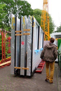 Modular wall sections, delivered and ready for installation.