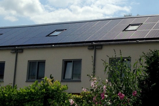 New solar photovoltaic modules cover the roof area of a renovated project in the Netherlands.