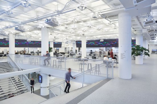 Each coffer in the waffle-slab ceiling is uplight with a tunable retrofit PAR38 LED lamp.