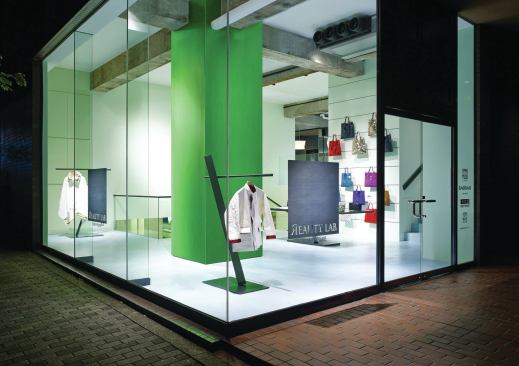 The other entrance is a bright spot in the streetscape of Tokyo’s Aoyama shopping district. Miyake’s Homme Plissé menswear line, which combines heavy fabrics with the designer’s signature pleats, inspired Yoshioka to create textural contrasts between construction materials. 