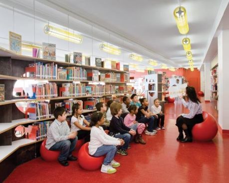 At P.S. 31, where the ceiling heights are 9 feet 6 inches tall, a surface-mounted version of the luminaire was used.