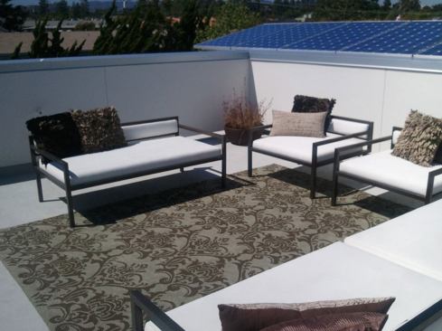 Private rooftop decks offer ocean views.