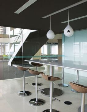 A  Moser handblown three-layer white opal glass pendant Louis Poulsen Lighting 
www.louispoulsen.com Suspended light with handblown glass  • Inspired by a falling drop of water  • Designed by Anu Moser  • Glossy, white opal glass; matte white opal glass; or spiral pattern, white opal glass shades  • Glass shades are handblown in three layers  • Available in three sizes with two light sources 
B  JoJo barstool with walnut seat and chrome base Allermuir 
www.allermuir.com Barstool is available with two frames: a high or low four-legged option, or with a height-adjustable center pedestal  • Pedestal and high four-legged options also feature footrests  • Seat can be veneered in clear-laquered alpi walnut, white-tinted alpi oak, or beech and stained in four finishes  • Additional washes are available  • Seat is formed with three-dimensional plyforming technology  • Base can be specified with choice of four epoxy polyester powder coatings or in bright or satinfinished chrome